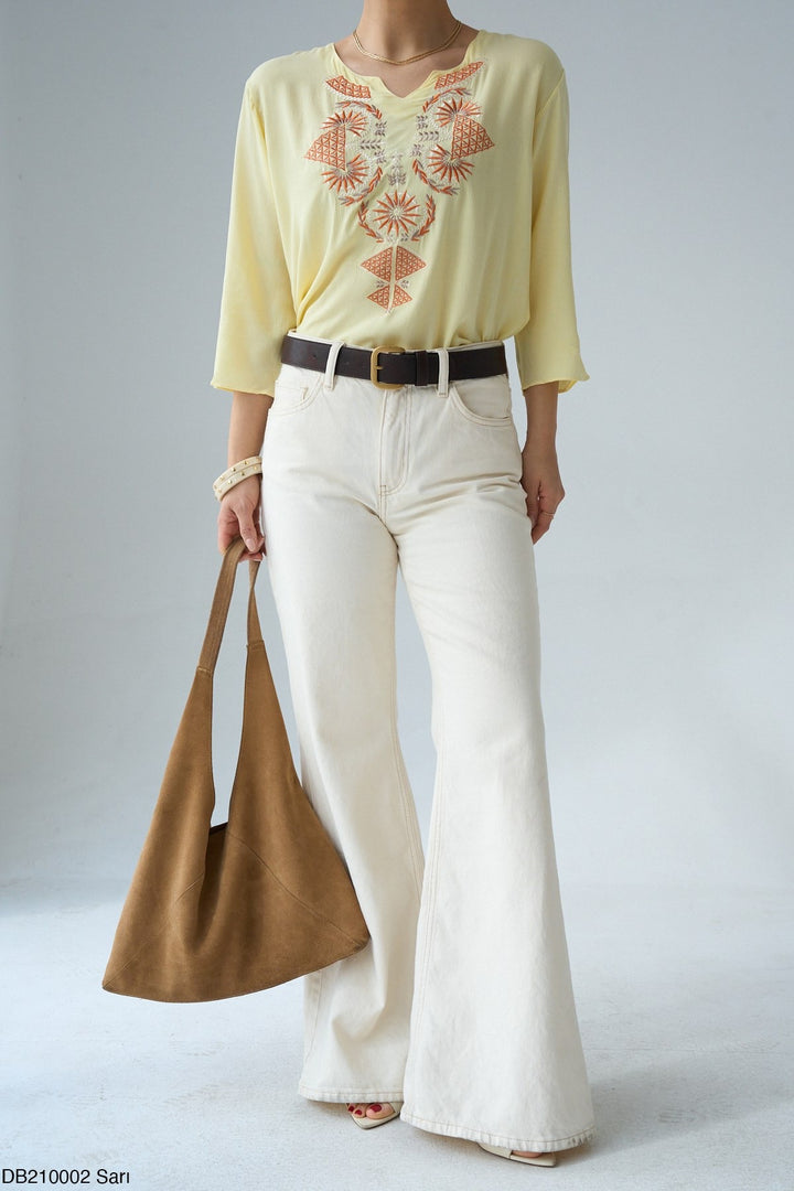 Élan™ Embroidered Flow Top